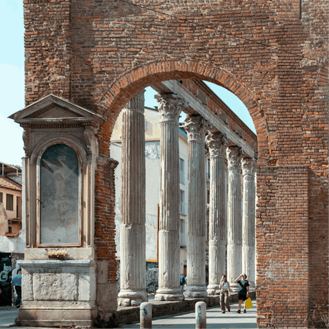 Stroll to the historic Colonne di San Lorenzo, 20 minutes away
