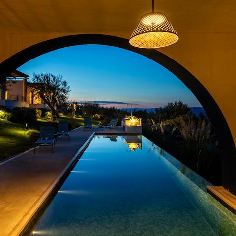Swim towards the sunset in the infinity pool, partially covered by a unique loggia