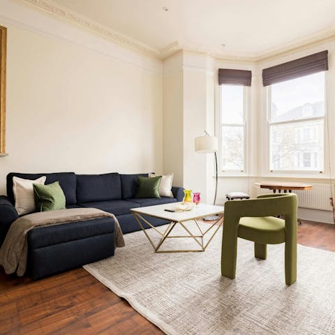 Relax with a good book in the light-filled living room