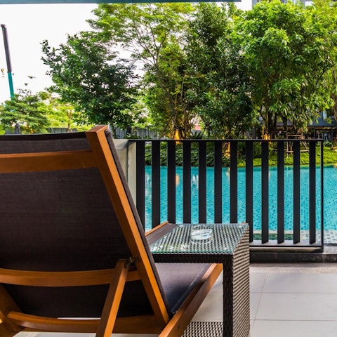 Chill out on the private poolside balcony