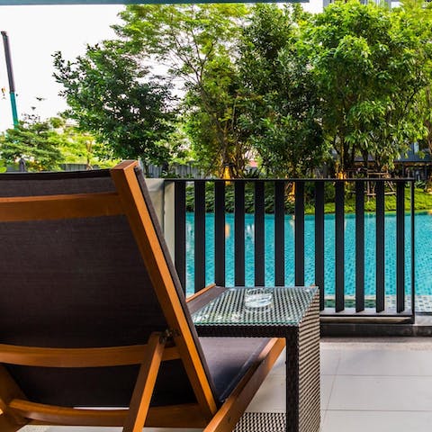 Chill out on the private poolside balcony