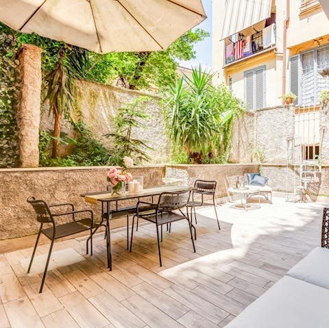Relax in the private garden with a glass of Prosecco