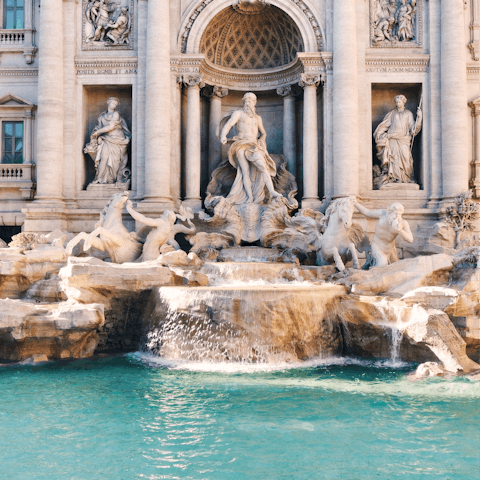 Visit the stunning Trevi Fountain, a short stroll away