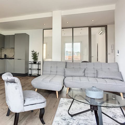 Enjoy a glass of Champagne in the modern living area