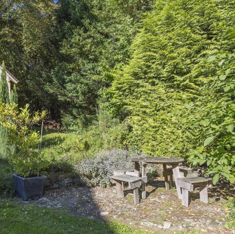 Find a secret spot in the seven acres of garden to spot green woodpeckers