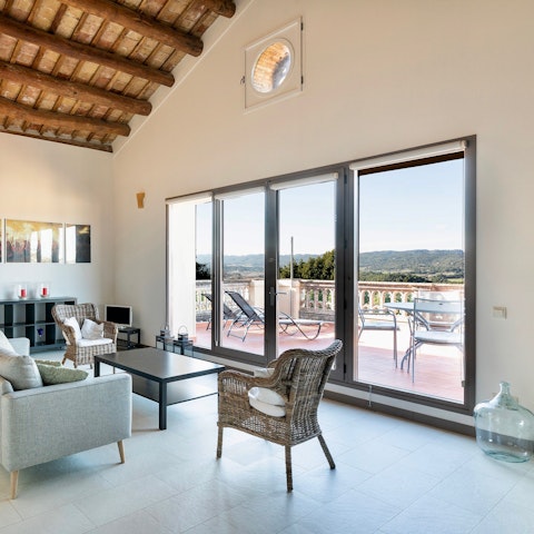 Open the balcony doors and admire views across the surrounding countryside