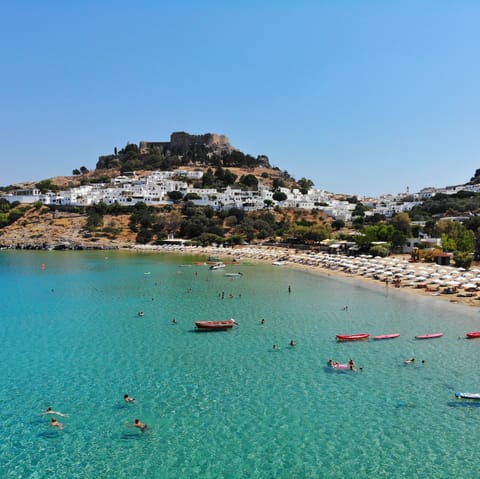 Visit Lindos and stop at its historic clifftop acropolis