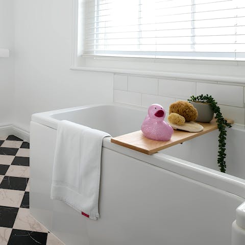 Unwind with a soak in the tub after a day of exploration