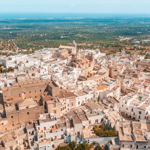 Drive into the city of Ostuni and visit the historic cathedral or try some local cuisine