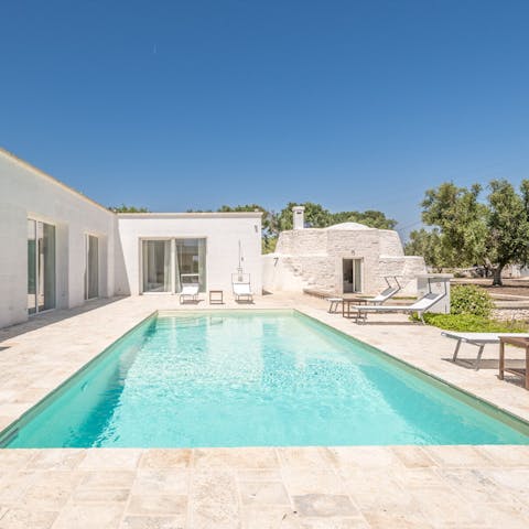 Work on your tan by the pool or swim a couple of laps to start your morning