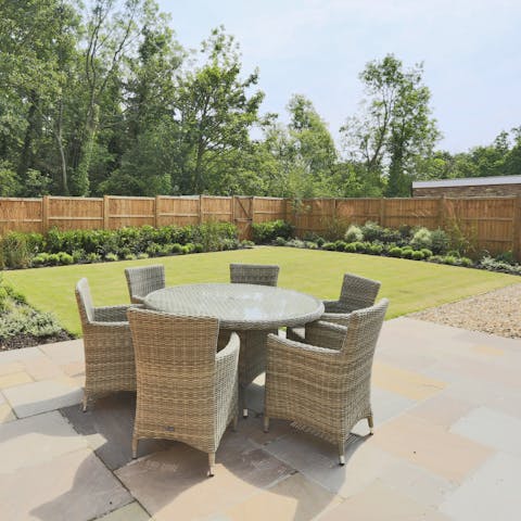 Sip sparkling wine on the patio and make the most of the summer evening sunlight