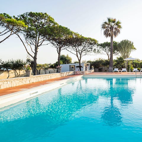 Spend relaxing days by the pool or adventure to one of the local beaches