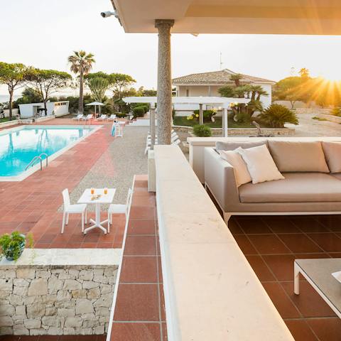 Pour a glass of your favourite drink and watch the sunset from the terrace