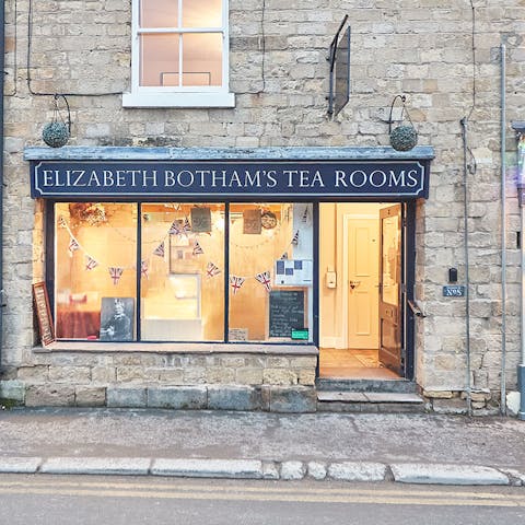Pick up a scone (or three) – this charming tearoom is just below your door