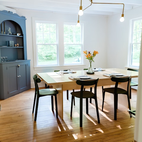Feast together in the light-filled dining room