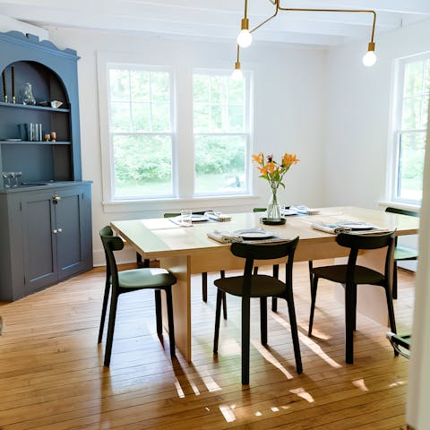 Feast together in the light-filled dining room