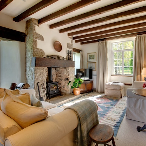 Cosy up by the log-burner with your favourite novel and a G&T