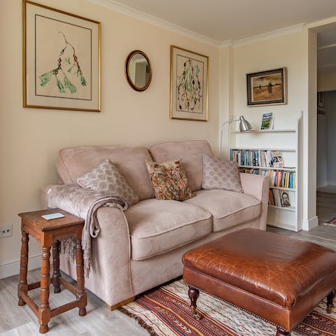 Settle down on the squishy sofa with a book from the host's collection and rest your feet after an evening ramble