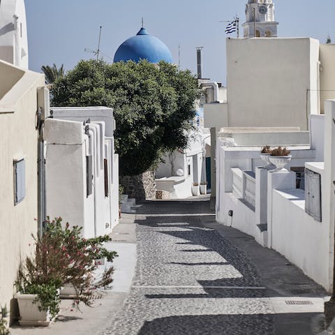 Weave through Megalochori's winding streets leading to your door
