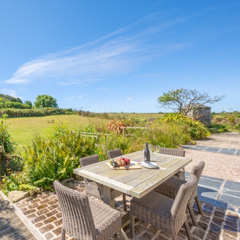 Set the table ready for a Ploughman's lunch in the sunshine