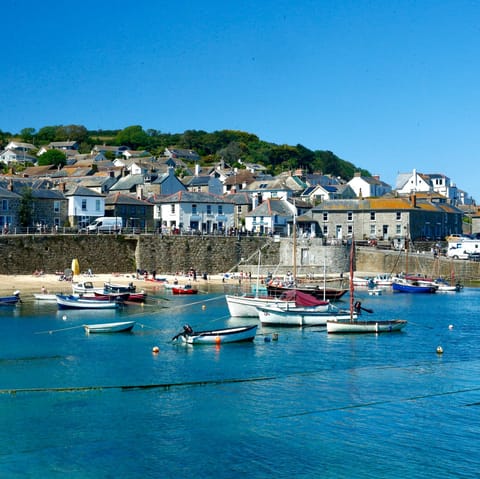 Visit the pretty fishing village of Mousehole, just a ten-minute drive away