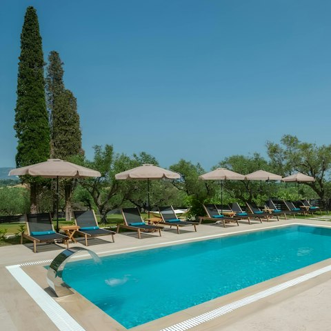 Enjoy long days lounging in the sunshine by the pool