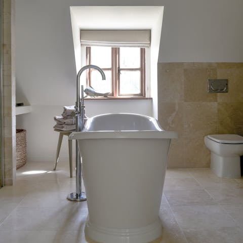 Reward yourself with a long session in the elegant bathtub after a day's rambling