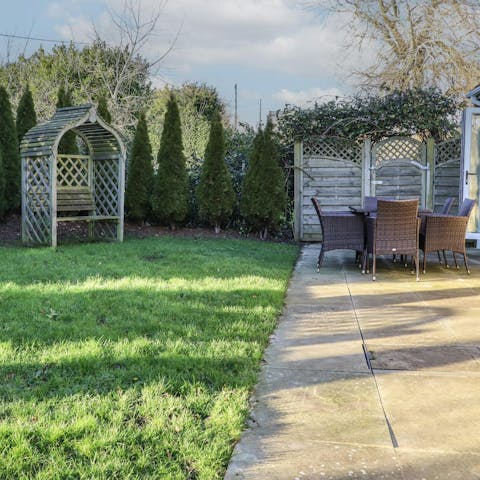 Enjoy peaceful alfresco dining in the enclosed garden