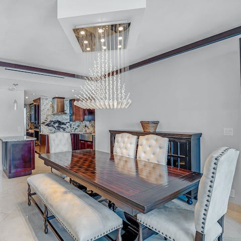 Gather together at the elegant dining table for celebratory meals