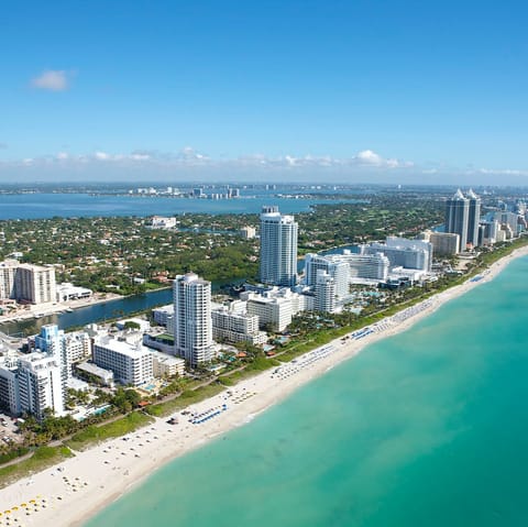Relax on Miami Beach, just an eighteen-minute drive across the bridge