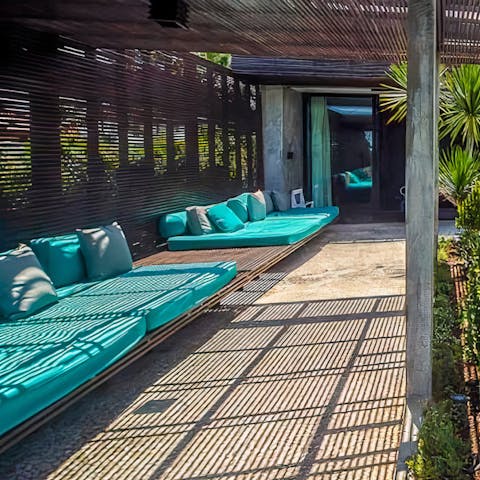 Relax on the floating day beds when taking moments of solitude