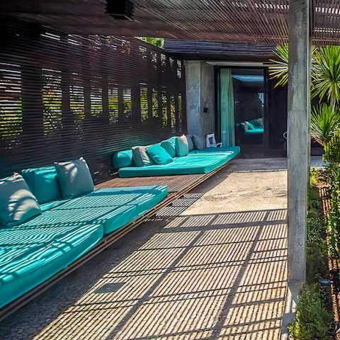 Relax on the floating day beds when taking moments of solitude