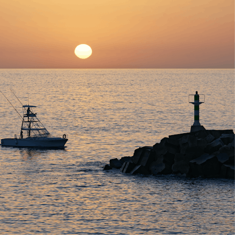 Drive down to Calheta Beach in just over five minutes and paddle in the peaceful waters
