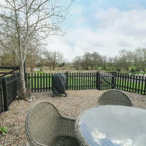 Enjoy a glass of wine on the courtyard patio