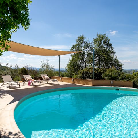 Swim in the pool and admire the scenery