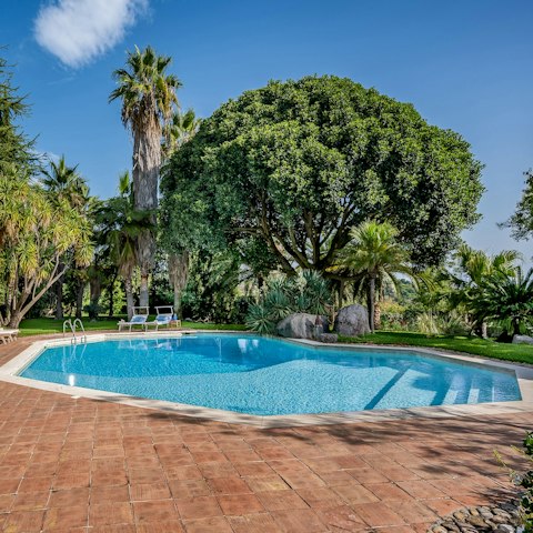Look forward to leisurely days enjoying the sunny pool
