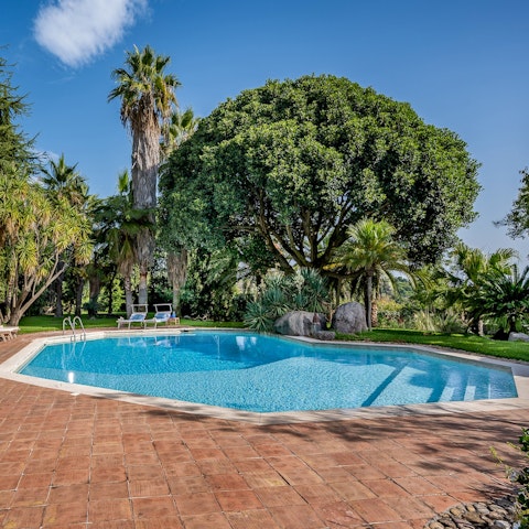 Look forward to leisurely days enjoying the sunny pool