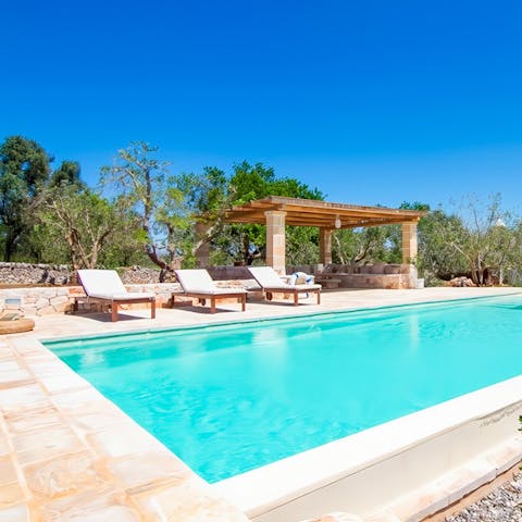 Grab a lounger by the pool and soak up the sun