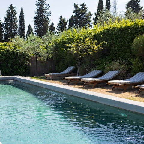 Soak up the sun by the swimming pool