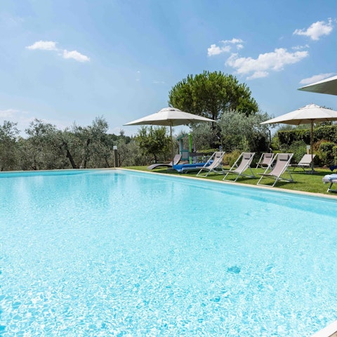 Relax by the pool, surrounded by nature