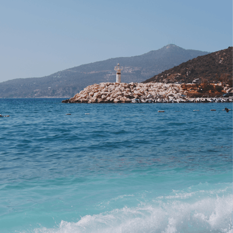 Swim, shop, and dine in the seaside town of Kalkan, a ten-minute drive away