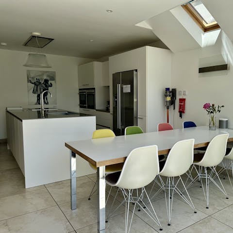 Cook up a storm in the sleek kitchen for a quiet meal at home