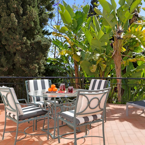 Enjoy peaceful drinks served on the terrace