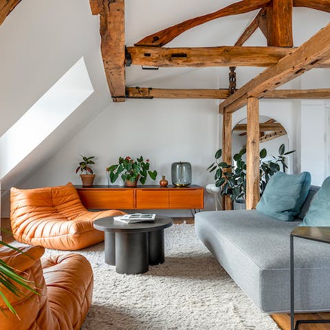 Sink into the living room's comfy chairs with a glass of wine and a good book