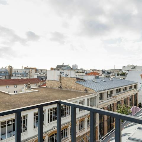 Take in views of the Eiffel Tower and Saint-Eustache Church from the private balcony
