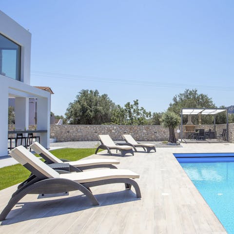 Spend lazy days lounging by the pool