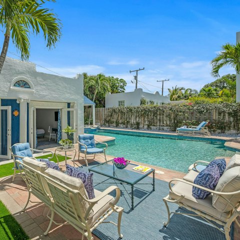 Relax in the sunshine by the  heated pool or in the hot tub