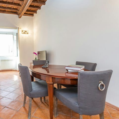 Dine together beneath traditional wooden beams