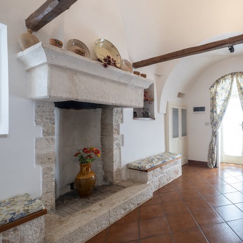 Step back in time inside with old stone fireplaces and wooden beams