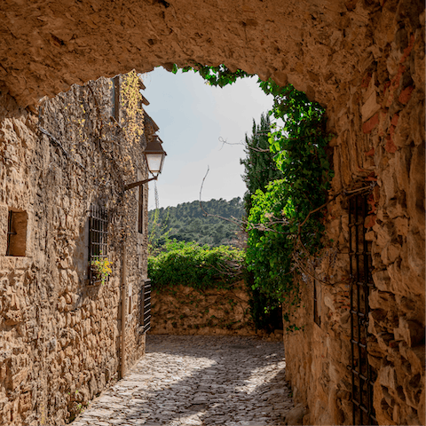 Immerse yourself in the charm of Girona while walking to the Platja de Sa Riera